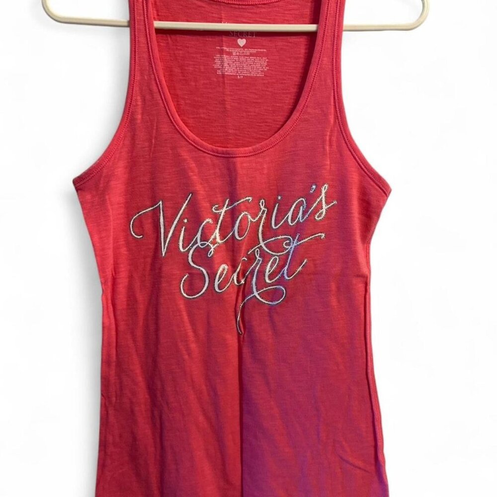 Victoria's Secret pink tank top with silver glitter logo.